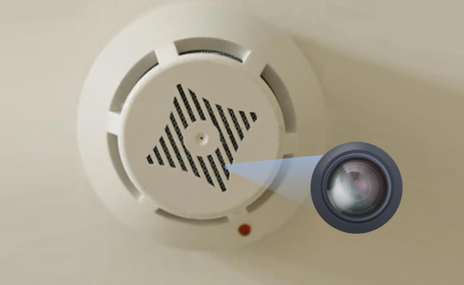 This pictures shows a hidden camera in a smoke detector